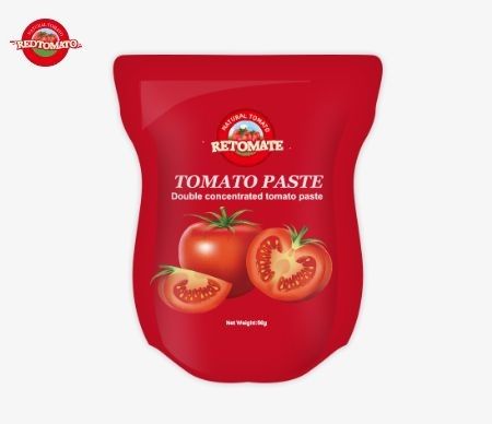 Sacchetto stand-up contenente 56 g di pasta di pomodoro doppiamente concentrata con purezza compresa tra il 28% e il 100%
